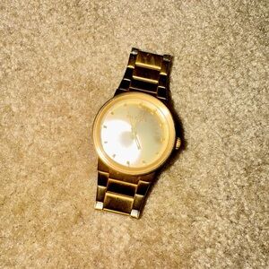 Nixon Cannon Gold Tone Stainless Steel "Shoot to Thrill" Watch